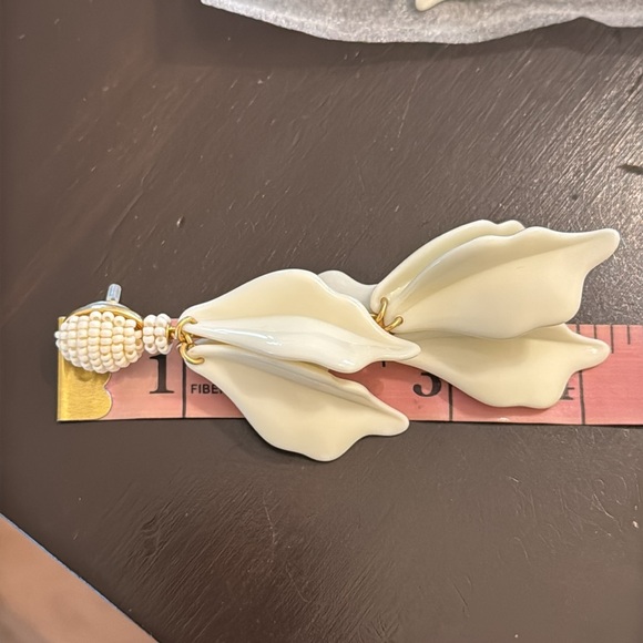 White Floral Drop Earrings
TUCKERNUCK JEWELRY - Picture 3 of 7